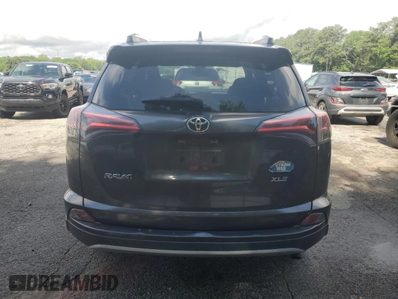 2018 Toyota RAV4 XLE with VIN JTMWFREV5JJ747297, listed as a Copart auction lot 56371505 with 215,598 mi miles and Clean Title. Bid and sale history available at DreamBid. Image 7.