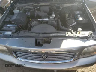 2000 Cadillac Escalade z VIN 1GYEK63R3YR218500, wystawiony jako Copart lot #77676354 z przebiegiem 164 602 mil mil oraz Tytuł czysty. Historia ofert i sprzedaży dostępna na DreamBid. Obrazek 12.
