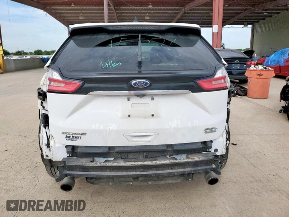 2020 Ford Edge SEL с VIN 2FMPK3J93LBB16928, выставлен на аукционе Copart как лот 63030385 с пробегом 81 567 миль миль и Чистый • Clean title. История ставок и продаж доступна на DreamBid. Изображение 6.