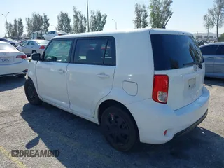2014 Scion xB with VIN JTLZE4FE5EJ065953, listed as a IAAI auction lot 41850554 with 124,856 mi miles. Bid and sale history available at carsss.com. Image 3.