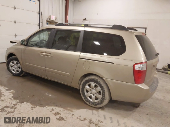 2007 Kia Sedona EX with VIN KNDMB233576160010, listed as a IAAI auction lot 41666497 with 206,834 mi miles. Bid and sale history available at carsss.com. Image 3.