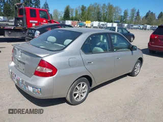 2003 Toyota Prius with VIN JT2BK18U630086718, listed as a IAAI auction lot 42036644 with 251,852 mi miles. Bid and sale history available at carsss.com. Image 4.