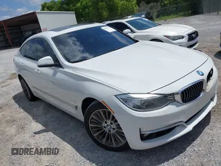2015 BMW 3 Series 335i Gran Turismo xDrive z VIN WBA3X9C53FD868920, wystawiony jako IAAI lot #42221368 z przebiegiem 128 115 mil mil oraz . Historia ofert i sprzedaży dostępna na DreamBid. Obrazek 1.