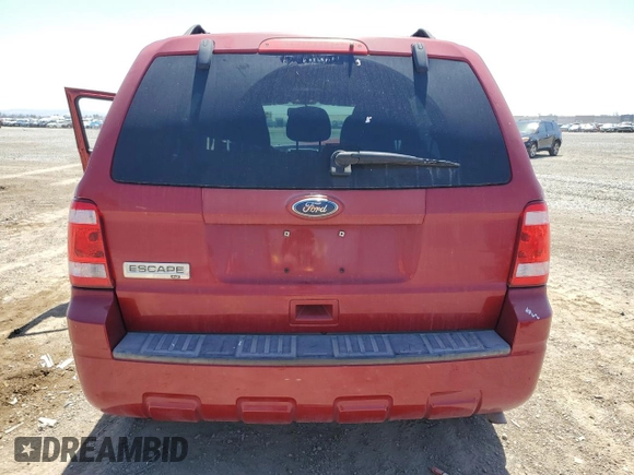2010 Ford Escape XLT с VIN 1FMCU0D71AKD20051, выставлен на аукционе Copart как лот 57419695 с пробегом 115 436 миль миль и Списание • Salvage title. История ставок и продаж доступна на DreamBid. Изображение 6.