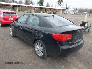 2010 Kia Forte SX with VIN KNAFW4A38A5123068, listed as a IAAI auction lot 41934416 with 95,097 mi miles. Bid and sale history available at carsss.com. Image 3.