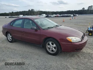 2005 Ford Taurus SE with VIN 1FAFP53205A282454, listed as a Copart auction lot 51052425 with 116,706 mi miles and Salvage Title. Bid and sale history available at carsss.com. Image 4.
