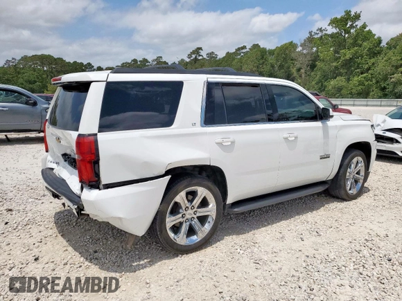 2019 Chevrolet Tahoe LT with VIN 1GNSCBKC1KR226315, listed as a Copart auction lot 57215915 with 153,170 mi miles and Salvage title. Bid and sale history available at DreamBid. Image 3.