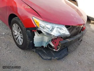 2014 Toyota Camry L with VIN 4T1BF1FK3EU770985, listed as a IAAI auction lot 41896125 with 146,100 mi miles. Bid and sale history available at carsss.com. Image 18.