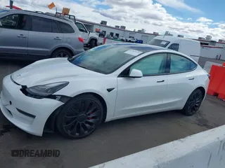 2022 Tesla Model 3 Performance with VIN 5YJ3E1EC6NF111958, listed as a IAAI auction lot 41583972 with 28,431 mi miles and . Bid and sale history available at DreamBid. Image 18.