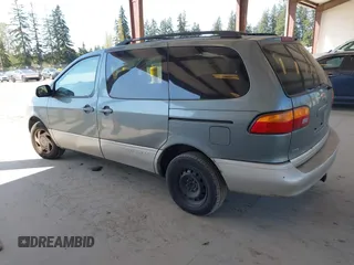 1999 Toyota Sienna LE with VIN 4T3ZF13C4XU166786, listed as a IAAI auction lot 42057995 with 316,259 mi miles. Bid and sale history available at carsss.com. Image 3.