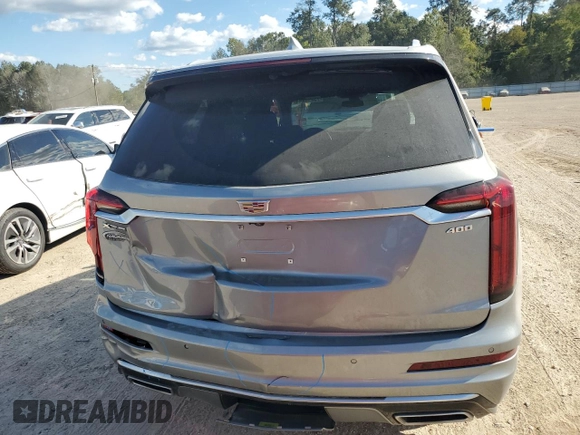 2023 Cadillac XT6 FWD Premium Luxury with VIN 1GYKPCRS0PZ231233, listed as a Copart auction lot 73210244 with 14,604 mi miles and Salvage Title. Bid and sale history available at carsss.com. Image 6.