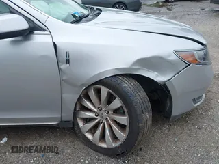2013 Lincoln MKS with VIN 1LNHL9DK4DG606551, listed as a IAAI auction lot 42343140 with 70,424 mi miles and . Bid and sale history available at DreamBid. Image 6.