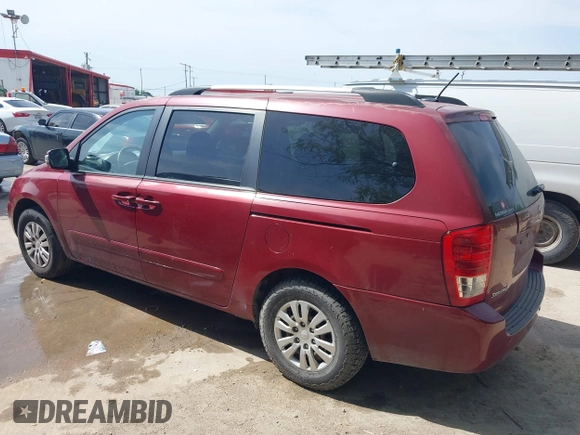 2014 Kia Sedona LX with VIN KNDMG4C71E6564595, listed as a IAAI auction lot 42015687 with 208,270 mi miles. Bid and sale history available at carsss.com. Image 3.