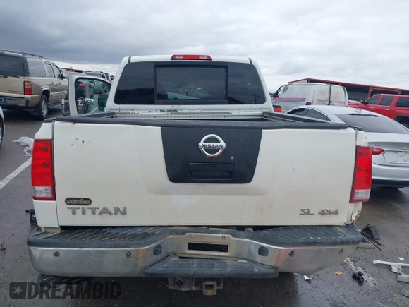 2012 Nissan Titan SL with VIN 1N6AA0EC7CN311109, listed as a IAAI auction lot 41420110 with 209,731 mi miles and . Bid and sale history available at DreamBid. Image 17.