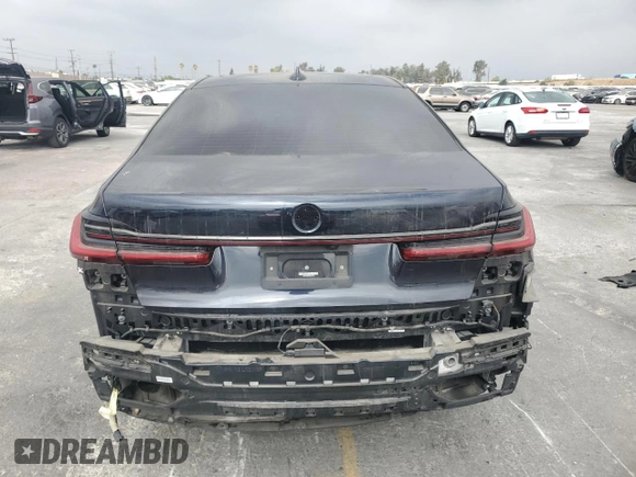 2022 BMW 7 Series 740i with VIN WBA7T2C04NCJ31237, listed as a Copart auction lot 76627214 with 44,630 mi miles and Salvage Title. Bid and sale history available at carsss.com. Image 6.