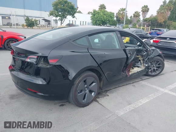 2023 Tesla Model 3 with VIN 5YJ3E1EA5PF647737, listed as a IAAI auction lot 42430145 with 20,525 mi miles and . Bid and sale history available at DreamBid. Image 4.