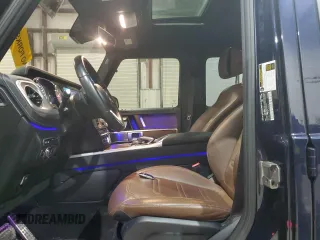 2020 Mercedes-Benz G 550 z VIN W1NYC6BJ8LX345414, wystawiony jako Copart lot #50952435 z przebiegiem 14 261 mil mil oraz Szkody całkowita. Historia ofert i sprzedaży dostępna na DreamBid. Obrazek 7.