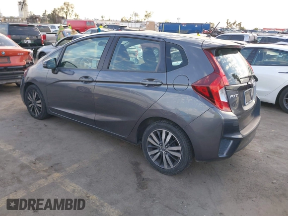 2015 Honda Fit LX with VIN 3HGGK5H5XFM719477, listed as a IAAI auction lot 41671194 with 145,876 mi miles. Bid and sale history available at carsss.com. Image 3.