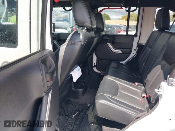 2016 Jeep Wrangler Unlimited Rubicon with VIN 1C4HJWFG7GL254143, listed as a IAAI auction lot 41781962 with 114,435 mi miles and . Bid and sale history available at DreamBid. Image 8.