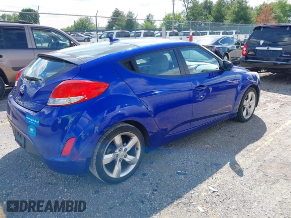 2012 Hyundai Veloster w/Gray Int z VIN KMHTC6AD3CU074501, wystawiony jako IAAI lot #42289456 z przebiegiem 94 303 mil mil oraz . Historia ofert i sprzedaży dostępna na DreamBid. Obrazek 4.