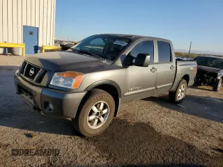 2012 Nissan Titan S with VIN 1N6AA0EC2CN313771, listed as a Copart auction lot 84758904 with 164,460 mi miles and Salvage Title. Bid and sale history available at carsss.com. Image 1.