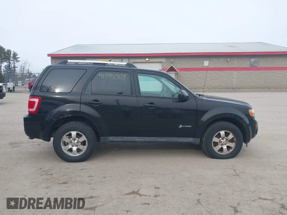2011 Ford Escape Hybrid with VIN 1FMCU5K3XBKB73534, listed as a IAAI auction lot 41795069 with 160,000 mi miles and . Bid and sale history available at DreamBid. Image 14.