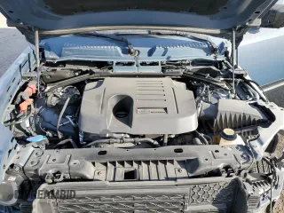 2023 Land Rover Defender SE with VIN SALEPEEU8P2115950, listed as a Copart auction lot 82717694 with 18,246 mi miles and Salvage title. Bid and sale history available at DreamBid. Image 12.