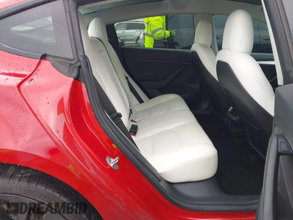 2021 Tesla Model 3 Performance with VIN 5YJ3E1EC5MF050598, listed as a IAAI auction lot 41778169 with 74,710 mi miles and . Bid and sale history available at carsss.com. Image 8.
