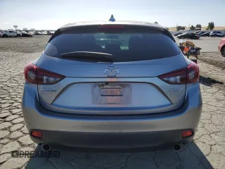 2015 Mazda 3 i Grand Touring z VIN JM1BM1M70F1260802, wystawiony jako Copart lot #60662705 z przebiegiem 89 974 mil mil oraz Szkoda całkowita • Salvage title. Historia ofert i sprzedaży dostępna na DreamBid. Obrazek 6.