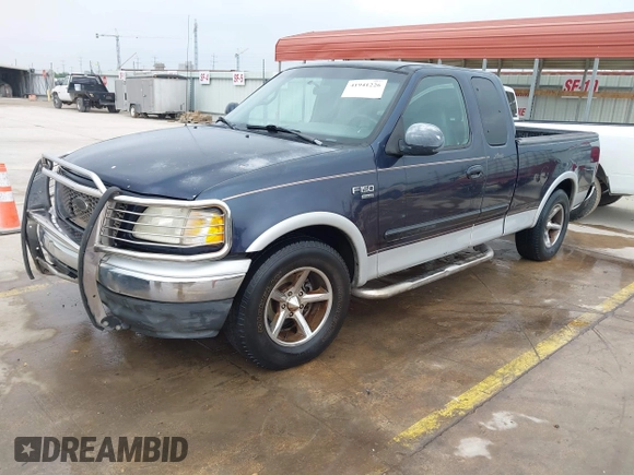 2000 Ford F-150 XL with VIN 1FTRX17L0YKA68579, listed as a IAAI auction lot 41941226 with 1 mi miles. Bid and sale history available at carsss.com. Image 19.