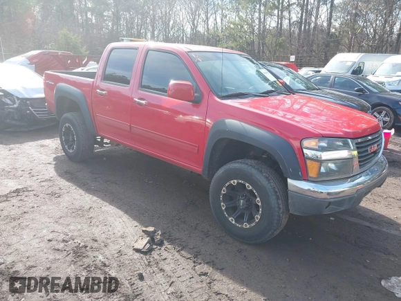 2012 GMC Canyon SLE1 with VIN 1GTH6MFE9C8107145, listed as a IAAI auction lot 41440495 with 218,557 mi miles. Bid and sale history available at carsss.com. Image 1.