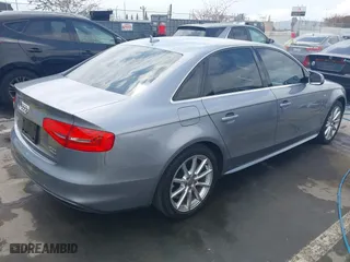 2016 Audi A4 Premium with VIN WAUBFAFLXGN004596, listed as a IAAI auction lot 42125046 with 106,205 mi miles. Bid and sale history available at carsss.com. Image 4.