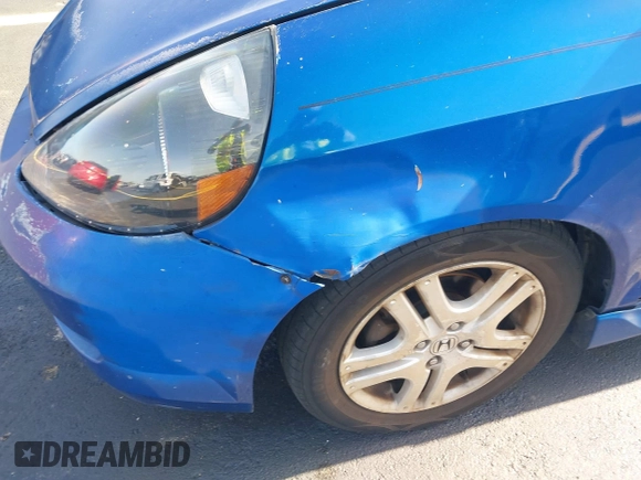 2007 Honda Fit Sport z VIN JHMGD38637S015957, wystawiony jako IAAI lot #42284728 z przebiegiem 176 383 mil mil oraz . Historia ofert i sprzedaży dostępna na DreamBid. Obrazek 13.