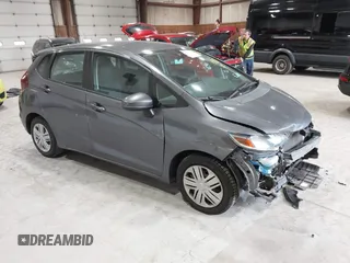 2019 Honda Fit LX z VIN 3HGGK5H45KM732610, wystawiony jako IAAI lot #42347962 z przebiegiem 106 098 mil mil oraz . Historia ofert i sprzedaży dostępna na DreamBid. Obrazek 1.