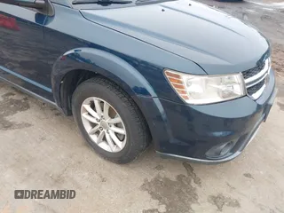 2014 Dodge Journey SXT z VIN 3C4PDCBG8ET126938, wystawiony jako IAAI lot #42526536 z przebiegiem 142 664 mil mil oraz . Historia ofert i sprzedaży dostępna na DreamBid. Obrazek 6.