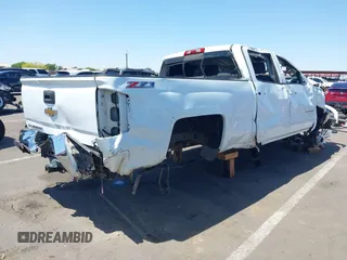 2015 Chevrolet Silverado 1500 LT with VIN 1GCUKREC5FF199331, listed as a IAAI auction lot 42111381 with 180,056 mi miles and . Bid and sale history available at DreamBid. Image 4.