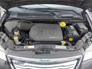 2015 Chrysler Town & Country Touring with VIN 2C4RC1BGXFR655330, listed as a IAAI auction lot 42181430 with 148,195 mi miles and . Bid and sale history available at DreamBid. Image 10.