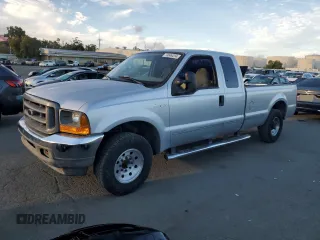 1999 Ford Super Duty F-250 XL with VIN 1FTNX20F3XED60894, listed as a Copart auction lot 74849284 with 148,779 mi miles and Salvage Title. Bid and sale history available at carsss.com. Image 1.