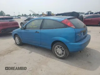 2007 Ford Focus S z VIN 1FAFP31N77W138844, wystawiony jako Copart lot #60702195 z przebiegiem Nie podano mil oraz Czysty tytuł • Clean title. Historia ofert i sprzedaży dostępna na DreamBid. Obrazek 2.