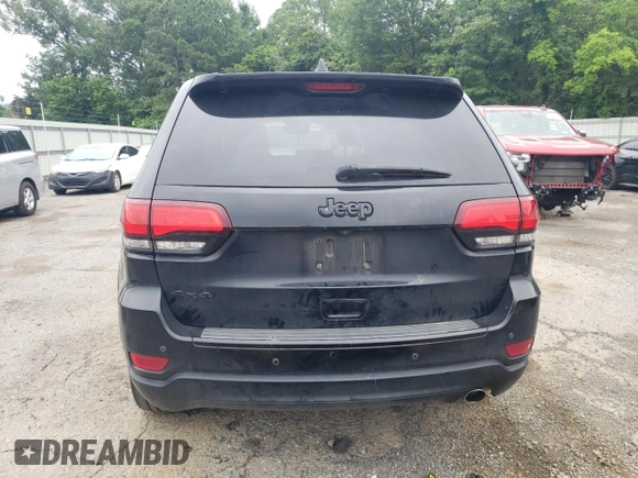 2018 Jeep Grand Cherokee Laredo E with VIN 1C4RJFAG4JC138319, listed as a Copart auction lot 54956925 with 144,938 mi miles and Salvage title. Bid and sale history available at DreamBid. Image 6.