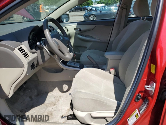2010 Toyota Corolla with VIN 2T1BU4EE5AC533817, listed as a Copart auction lot 61977715 with 101,586 mi miles and Salvage title. Bid and sale history available at DreamBid. Image 7.