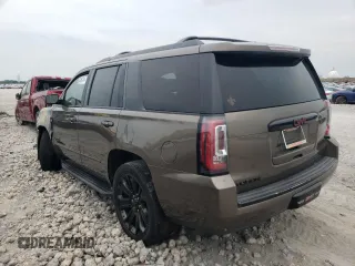 2016 GMC Yukon Denali with VIN 1GKS1CKJ6GR241889, listed as a Copart auction lot 67661734 with 0 mi miles and Salvage Title. Bid and sale history available at carsss.com. Image 2.
