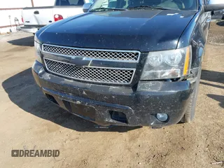 2012 Chevrolet Suburban LTZ with VIN 1GNSKKE74CR324578, listed as a IAAI auction lot 42129334 with 182,655 mi miles. Bid and sale history available at carsss.com. Image 6.