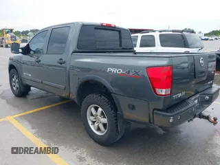 2010 Nissan Titan Pro-4X with VIN 1N6BA0EC9AN323943, listed as a IAAI auction lot 42795482 with 200,453 mi miles and . Bid and sale history available at DreamBid. Image 3.