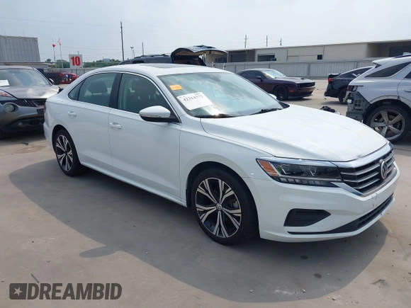 2021 Volkswagen Passat SE z VIN 1VWSA7A32MC014376, wystawiony jako IAAI lot #42314372 z przebiegiem 81 209 mil mil oraz . Historia ofert i sprzedaży dostępna na DreamBid. Obrazek 1.