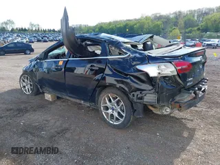 2016 Ford Focus Titanium with VIN 1FADP3J22GL242818, listed as a IAAI auction lot 42177015 with Not provided miles and . Bid and sale history available at DreamBid. Image 3.