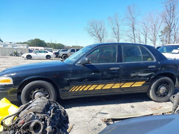 2009 Ford Police Interceptor with VIN 2FAHP71V19X117303, listed as a IAAI auction lot 41598839 with 1 mi miles. Bid and sale history available at carsss.com. Image 14.