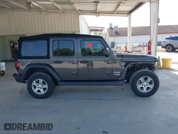 2020 Jeep Wrangler Unlimited Sport S with VIN 1C4HJXDN9LW167442, listed as a IAAI auction lot 42308617 with 59,335 mi miles and . Bid and sale history available at DreamBid. Image 14.
