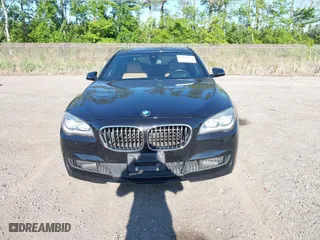 2015 BMW 7 Series 750Li with VIN WBAYE8C50FD781384, listed as a IAAI auction lot 42049829 with 128,087 mi miles. Bid and sale history available at carsss.com. Image 6.