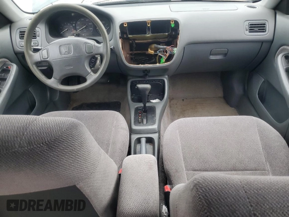 1997 Honda Civic LX z VIN 2HGEJ6676VH507855, wystawiony jako Copart lot #56684455 z przebiegiem 185 498 mil mil oraz Szkoda całkowita • Salvage title. Historia ofert i sprzedaży dostępna na DreamBid. Obrazek 8.